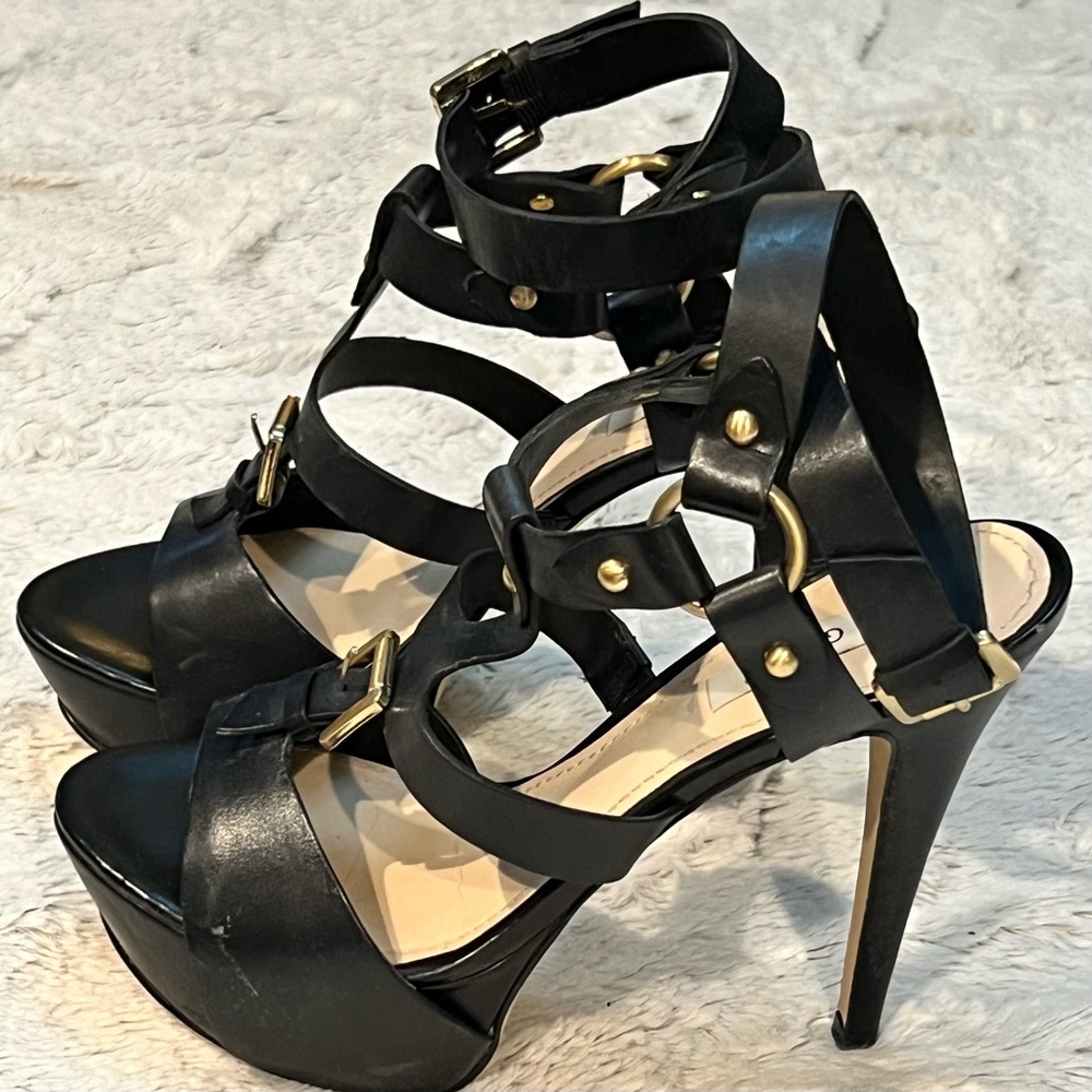 Guess-Ormandi platform gladiator heels, size 7 black, 5 inch heel, gold hardware